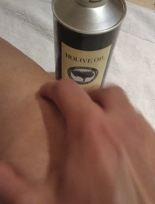 soothing knee pain with olive oil massage